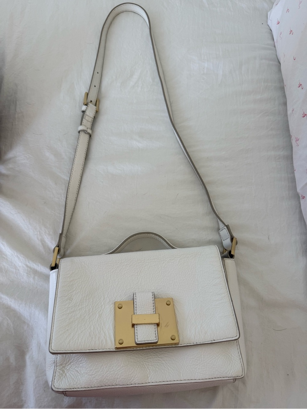 India Hicks “Lady P” white leather shoulder bag with gold hardware
